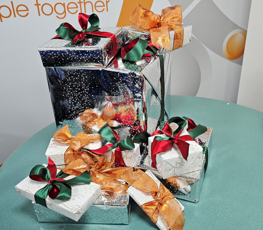 A table full of carefully wrapped presents